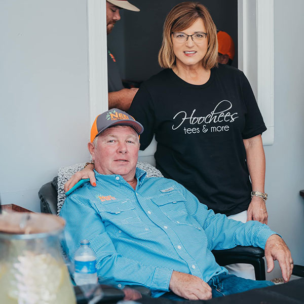 Neel and woman posing for the picture